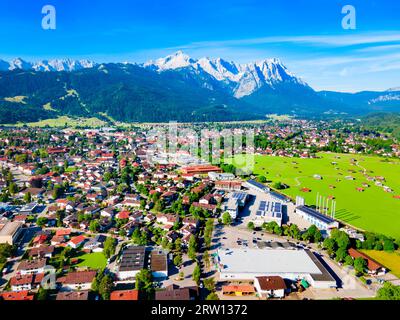 Garmisch-partenkirchen and Zugspitze mountain aerial panoramic view. Garmisch Partenkirchen is an Alpine ski town in Bavaria, southern Germany. Stock Photo