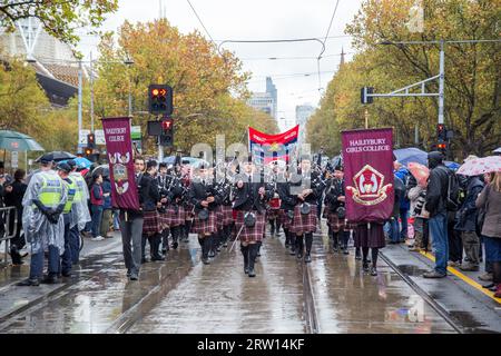 Melbourne, Australia, April 25, 2015: A military marching band in kilts playing bagpipe at the ANZAC Day parade Stock Photo
