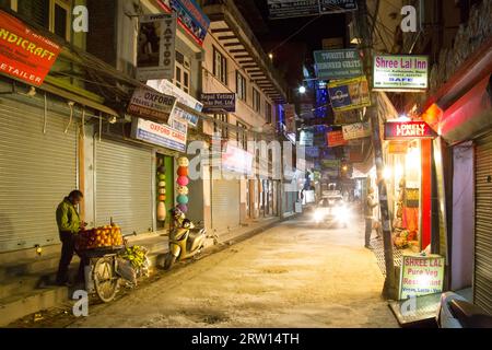 Kathmandu, Nepal, October 18, 2014: Closed shops in an almost empty shopping street in Thamel district by night Stock Photo