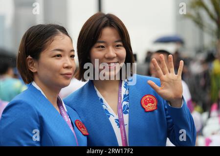 Hangzhou, China's Zhejiang Province. 16th Sep, 2023. Chen Qingchen (L) and Jia Yifan, badminton players of the Chinese delegation, pose after the opening ceremony for the Hangzhou Asian Games Village in Hangzhou, east China's Zhejiang Province, Sept. 16, 2023. Credit: Xue Yuge/Xinhua/Alamy Live News Stock Photo