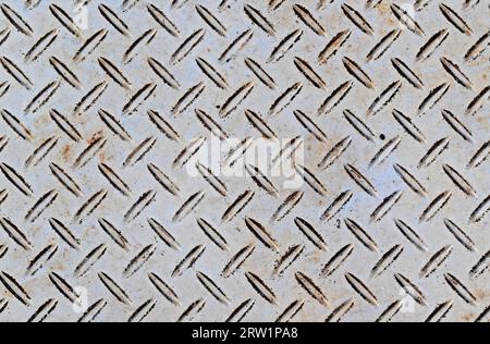Metallic surface pattern on floor Stock Photo