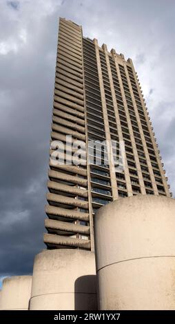 Low angle exterior view of Defoe House tower flats luxury apartments on the Barbican Estate in the City of London England UK 2023 KATHY DEWITT Stock Photo