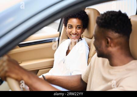 African American man holding girlfriends hand Stock Photo