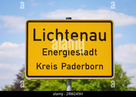 21.06.2023, Germany, North Rhine-Westphalia, Lichtenau - The sign at the entrance to Lichtenau, an energy town in the Paderborn district. The wind far Stock Photo