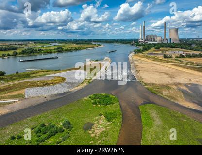 20.07.2023, Germany, North Rhine-Westphalia, Dinslaken - Renaturation of the Emscher. New Emscher discharge into the Rhine. In the background, the dis Stock Photo