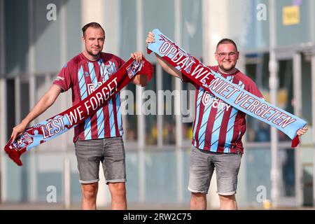 Arnhem, Netherlands. 16th Sep, 2023. ARNHEM, NETHERLANDS - SEPTEMBER 16: Vitesse fans with the new Vitesse Airborne outfit and banners during the Dutch Eredivisie match between Vitesse and RKC Waalwijk at Stadion Gelredome on September 16, 2023 in Arnhem, Netherlands. (Photo by Ben Gal/Orange Pictures) Credit: Orange Pics BV/Alamy Live News Stock Photo