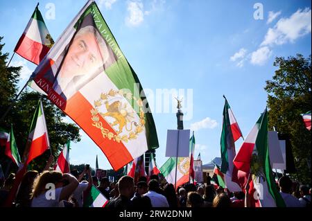 Berlin, Germany. 16th Sep, 2023. Demonstrators gather at the Victory Column to mark the anniversary of the death of Jina Mahsa Amini in Iran. On September 16, 2022, the young Iranian Kurdish woman Jina Mahsa Amini was killed in Iran. Credit: Annette Riedl/dpa/Alamy Live News Stock Photo