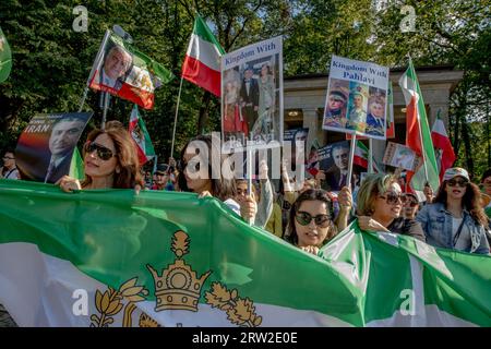 Berlin, Germany. 16th Sep, 2023. The area surrounding Berlin's iconic Victory Column was a sea of protesters on September 16, 2023; many held aloft images of Reza Pahlavi, the Crown Prince of Iran. The gathering marked the first anniversary of the tragic death of Mahsa Amini, a 22-year-old Iranian woman who died in the custody of Iran's morality police. Reza Pahlavi, the exiled son of Iran's last shah, has been a vocal critic of the Iranian regime. (Credit Image: © Michael Kuenne/PRESSCOV via ZUMA Press Wire) EDITORIAL USAGE ONLY! Not for Commercial USAGE! Stock Photo