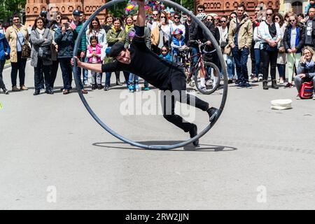 Barcelona, Catalonia Spain, May 01 2017 - Street performer entertaining crowds in Barcelona in front of the Arc de Triomf Stock Photo