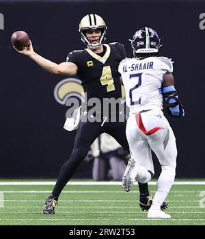 Tennessee Titans linebacker Azeez Al-Shaair, left, walks off the field  before an NFL football game against the Los Angeles Chargers, Sunday, Sept.  17, 2023, in Nashville, Tenn. (AP Photo/George Walker IV Stock