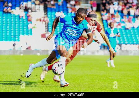 Peterborough, UK. 16th Sep 2023. David Ajiboye (16 Peterborough United) challenged by Theo Archibald (11 Leyton Orient) during the Sky Bet League 1 match between Peterborough and Leyton Orient at London Road, Peterborough on Saturday 16th September 2023. (Photo: Kevin Hodgson | MI News) Credit: MI News & Sport /Alamy Live News Stock Photo