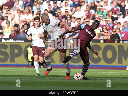 London, UK. 16th Sep, 2023. Kurt Zouma of West Ham Utd in a challenge with Erling Haland of Manchester City during the West Ham vs Manchester City Premier League match at the London Stadium Stratford. Credit: MARTIN DALTON/Alamy Live News Stock Photo