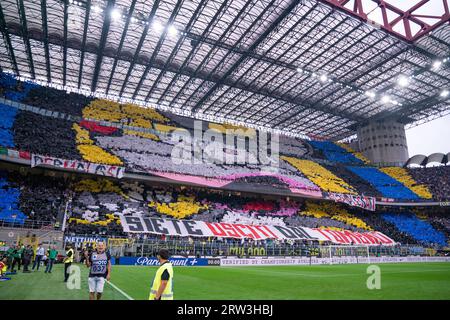 Inter fans from the Curva Nord tribune cheer on during the match