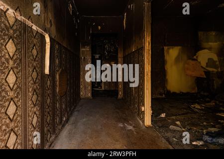 Burnt apartment house interior. Consequences of fire. Stock Photo