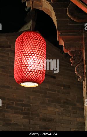 Red lanterns and gray brick carvings are in one exhibition hall Stock Photo