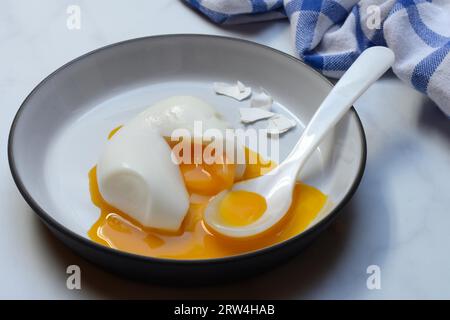 Soft boiled egg with spoon Stock Photo