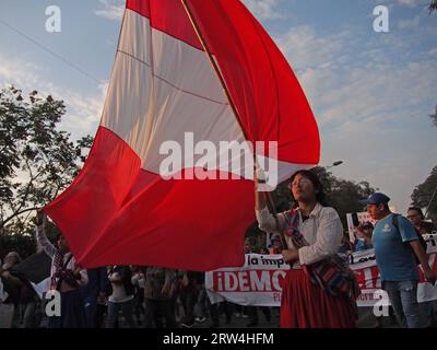 Lima, Peru. 16th Sep, 2023. Indigenous woman carrying a Peruvian flag when thousands of protesters took to the streets once again against the Government of Dina Boluarte and the Peruvian Congress after recent attempts to dismiss the National Board of Jurists (JNJ) and to persecute and criminalize journalistic coverage of political demonstrations. Credit: Fotoholica Press Agency/Alamy Live News Stock Photo