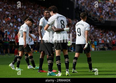Valencia, Spain. 16th Sep, 2023. Players of Valencia celebrate a goal during a Spanish La Liga football match between Valencia and Atletico Madrid in Valencia, Spain, Sept. 16, 2023. Credit: Str/Xinhua/Alamy Live News Stock Photo