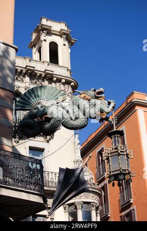Chinese dragon on 19th century House of Umbrellas (Casa Bruno Cuadros) building on La Rambla in Barcelona, Catalonia, Spain Stock Photo