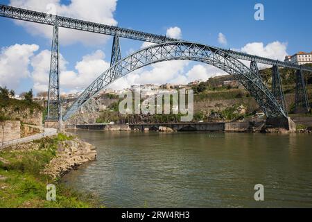 Maria Pia Bridge in Porto, Portugal, wrought iron railway arch bridge over Douro river, opened in 1877, construction of Gustave Eiffel Stock Photo