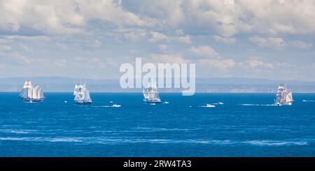 The Tall Ships fleet leave Port Phillip Bay near Melbourne, Australia Stock Photo