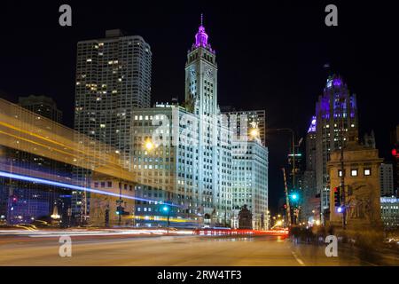 Chicago rush hour traffic from Lower Wacker Drive towards the Wrigley Building on Michigan Avenue in Illinois, USA Stock Photo