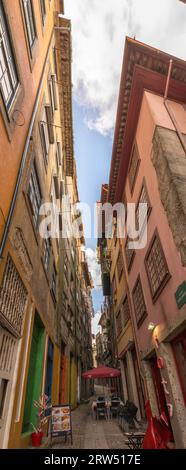 Porto, Portugal, April 26, 2014: View of facades, alleyway and traditional houses in Ribeira old and historic town and alongside Douro River, Porto Stock Photo