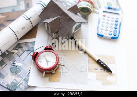 engineering tools on wooden table with drawings apartments top view Stock Photo