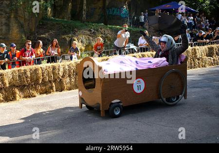 Prague, Czech Republic. 16th Sep, 2023. A competitor drives a bed-shaped vehicle during the Red Bull Kary race, a competition of handcrafted, non-motorized vehicles, in Prague, the Czech Republic, on Sept. 16, 2023. A total of 40 selected teams presented their home-made vehicles during the event at Park Kralovka in the Czech capital on Saturday. Credit: Dana Kesnerova/Xinhua/Alamy Live News Stock Photo