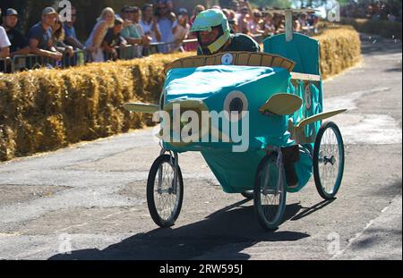 Prague, Czech Republic. 16th Sep, 2023. A competitor drives a fish-shaped vehicle during the Red Bull Kary race, a competition of handcrafted, non-motorized vehicles, in Prague, the Czech Republic, on Sept. 16, 2023. A total of 40 selected teams presented their home-made vehicles during the event at Park Kralovka in the Czech capital on Saturday. Credit: Dana Kesnerova/Xinhua/Alamy Live News Stock Photo