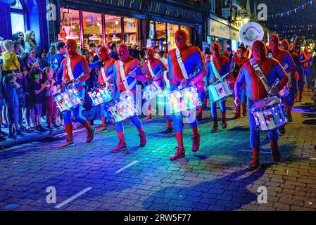 Spiderman band, Ringwood Carnival, Hampshire, UK, 16th September 2023. Marching band dressed as Spiderman. Stock Photo