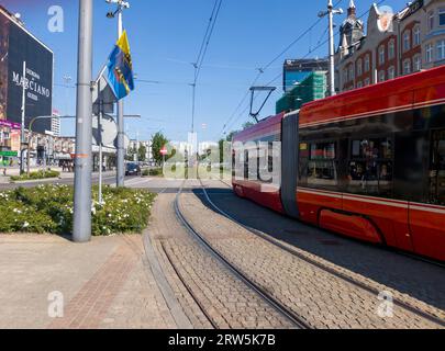 Red trams in the centre of Katowice, Poland Stock Photo