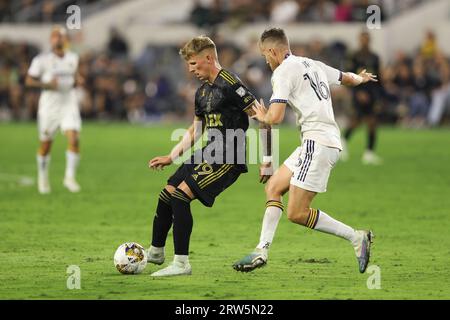 Los Angeles, California, USA. 16th Sep, 2023. Los Angeles FC midfielder MATEUSZ BOGUSZ (19) dribbles the ball during a MLS soccer match between Los Angeles Galaxy and Los Angeles FC at BMO Stadium in Los Angeles, California. (Credit Image: © Brenton Tse/ZUMA Press Wire) EDITORIAL USAGE ONLY! Not for Commercial USAGE! Stock Photo