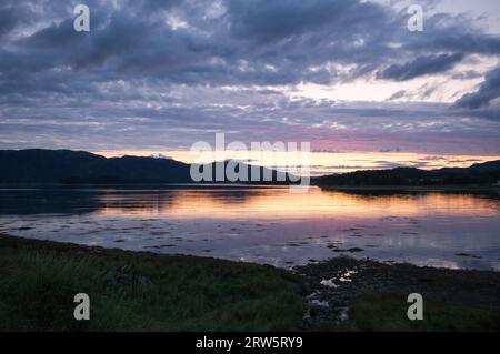 Sunset over a Norwegian fjord Stock Photo