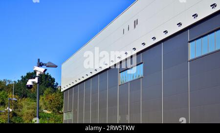 Minimalist photo of an exterior of a modern tin building Stock Photo