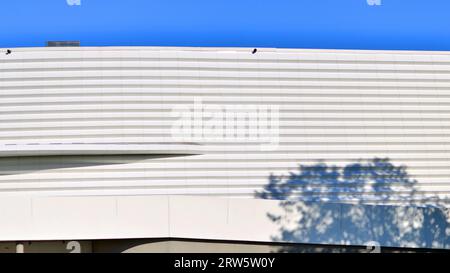 Minimalist photo of an exterior of a modern tin building Stock Photo