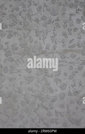 Gray putty of the facade of the house, the texture is created on the wall Stock Photo