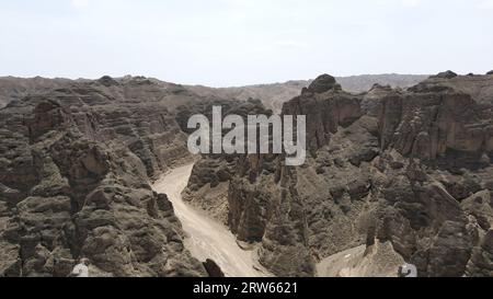 (230917) -- LANZHOU, Sept. 17, 2023 (Xinhua) -- This aerial photo taken on July 11, 2023 shows the Yellow River Stone Forest in Jingtai County of Baiyin City, northwest China's Gansu Province. The Yellow River, originating from the Bayan Har Mountains, meanders thousands of miles in Gansu. On both sides of the river, ancient cities, towns and villages formed and prospered, and became important guardians and inheritors of the Yellow River culture. In recent years, Gansu Province has continuously strengthened the preservation and revitalization of ancient cities, towns and villages along the Y Stock Photo