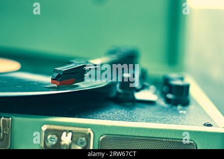 Vinyl Record spinning on turntable, Selective focus Stock Photo