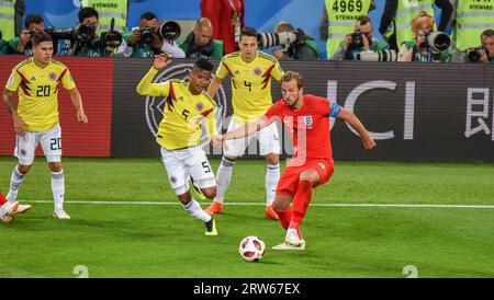 Moscow, Russia – July 3, 2018. England national football team striker Harry Kane and Colombia players Wilmar Barrios and Santiago Arias during World C Stock Photo
