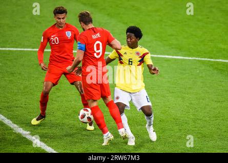 Moscow, Russia – July 3, 2018. Colombia national football team midfielder Carlos Sanchez against England players Dele Alli and Harry Kane during World Stock Photo