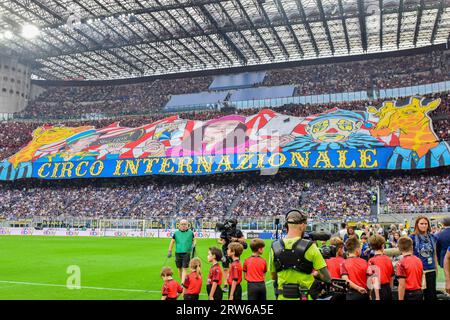 Milano, Italy. 16th Sep, 2023. Football fans of Inter seen on the stands with a huge tifo during the Serie A match between Inter and AC Milan at Giuseppe Meazza in Milano. (Photo Credit: Gonzales Photo/Alamy Live News Stock Photo