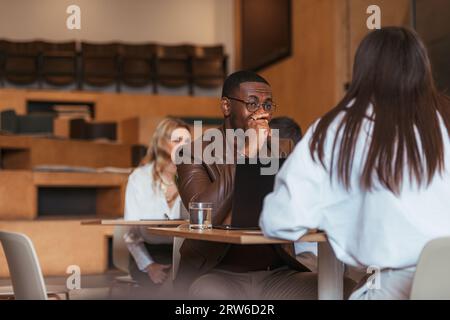 Two business friends talking at the cafe Stock Photo