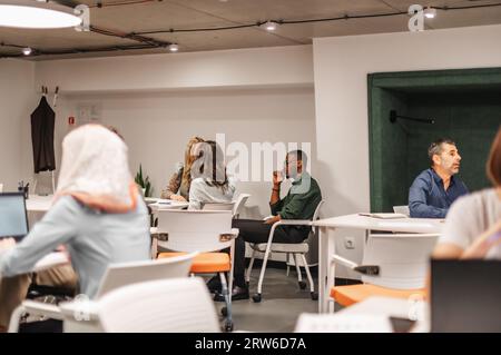 Group of multiracial employees working at the office Stock Photo