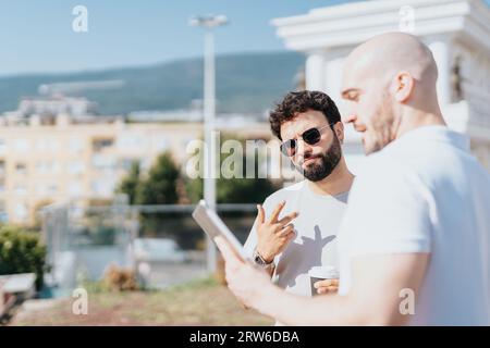 Successful Business Partners Outdoor Meeting for Architecture Project Stock Photo