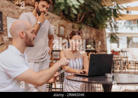 Business Professionals Strategizing for Profit Growth in a Cafe Bar Stock Photo