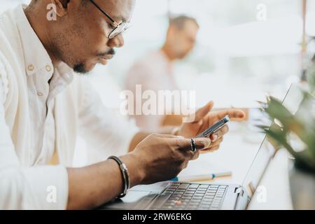 Focused Multiracial Business Professionals Sharing Ideas in Office for Successful Marketing Strategy Stock Photo