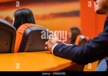 Student paying close attention and listening to a lecture Stock Photo