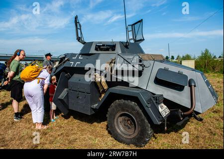 Nijmegen, Gelderland, Netherlands. 16th Sep, 2023. People are seen taking a closer look to a military vehicle. This month it will be 79 years ago that the troops of the American 82nd Airborne Division crossed the Waal River in Nijmegen, to liberate the city from the German occupiers. Because of that, a WWII encampment was recreated on the bank of the river, where re-enactors (participants in authentic military clothing) took visitors back in time with living history. (Credit Image: © Ana Fernandez/SOPA Images via ZUMA Press Wire) EDITORIAL USAGE ONLY! Not for Commercial USAGE! Stock Photo