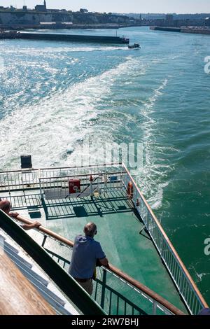 Travellers on the Seven Sisters ferry leaving Dieppe , Normandy  Dieppe is a fishing port on the Normandy coast of northern France Stock Photo